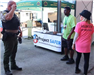 Sheriff with Project SAFER Volunteers