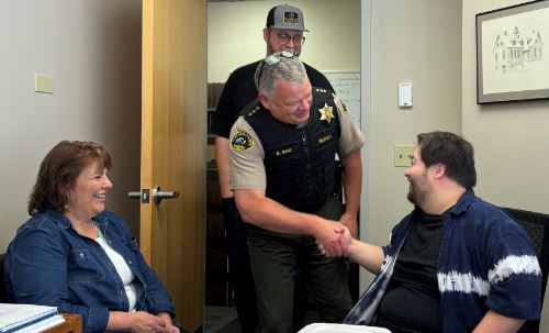 Shaking hand with law enforcement