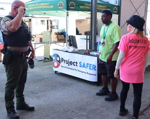 Sheriff with Project SAFER Volunteers